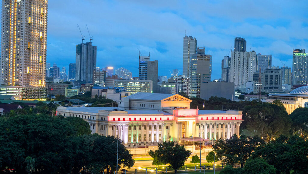 Aerial view of Manila’s skyline featuring the National Museum, illustrating one of the things to do in Manila for culture and sightseeing.