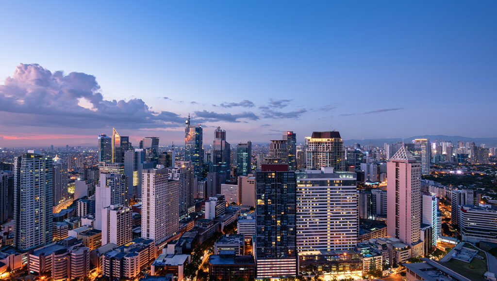 Aerial or skyline view of Manila city, capturing arrival vibes for travellers considering the best airline to fly to Philippines from UK.