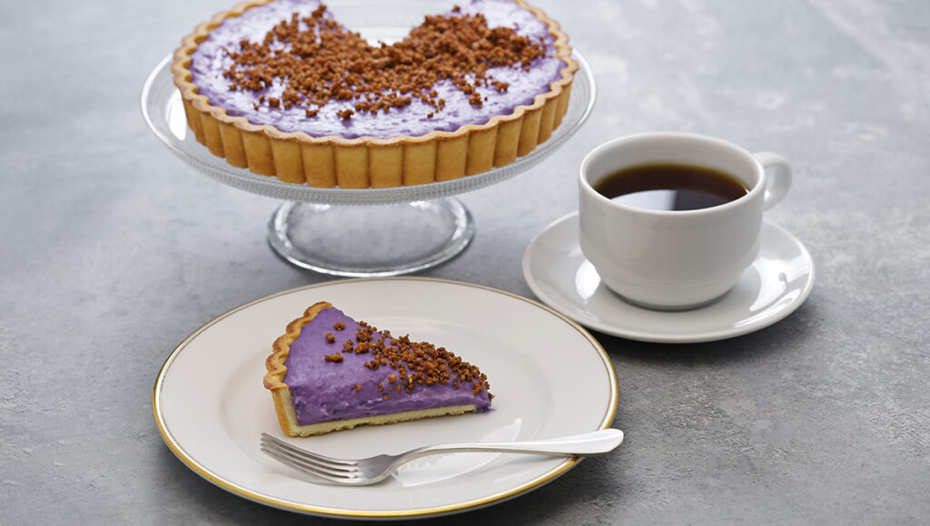 Vibrant Filipino desserts ube halaya made from mashed purple yam.