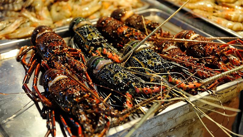 Fresh seafood dining at a restaurant in Coron — one of the best things to do in Coron, featuring locally caught fish
