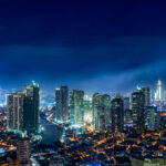 Dramatic, exciting night skyline of Makati or Bonifacio Global City, showcasing the vibrant urban life that proves why Manila is worth visiting.