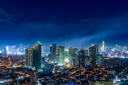 Dramatic, exciting night skyline of Makati or Bonifacio Global City, showcasing the vibrant urban life that proves why Manila is worth visiting.