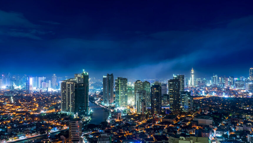 Dramatic, exciting night skyline of Makati or Bonifacio Global City, showcasing the vibrant urban life that proves why Manila is worth visiting.