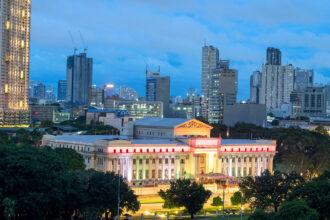 Aerial view of Manila’s skyline featuring the National Museum, illustrating one of the things to do in Manila for culture and sightseeing.