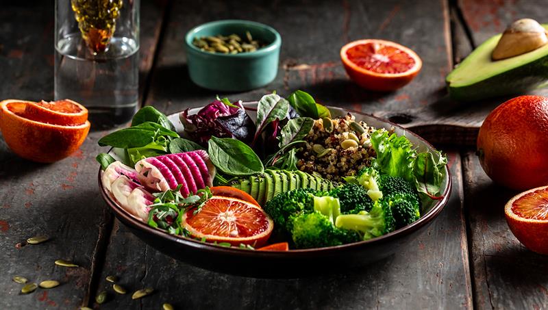 Is Philippines good for vegetarians? Colorful healthy vegetarian Buddha bowl with fresh vegetables, grains, and greens