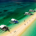 Undiscovered beaches in the Philippines featuring Kalanggaman Island in Leyte with its long white sandbar and crystal-clear blue sea