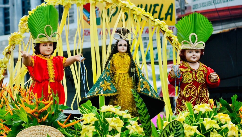 A traditional Ati Atihan festival doll representing the Santo Niño, highlighting cultural things to do in Kalibo during the annual celebration.