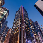Urban city skyline in the Philippines featuring modern architecture and lit windows at night, illustrating how long to spend in the Philippines when visiting metropolitan hubs like Manila.