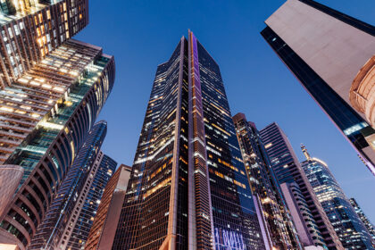 Urban city skyline in the Philippines featuring modern architecture and lit windows at night, illustrating how long to spend in the Philippines when visiting metropolitan hubs like Manila.