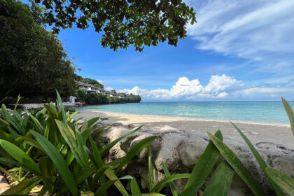 Pristine white sand and crystal-clear waters of a Zamboanga beach, showcasing why coastal destinations rank among the top places to visit in Zamboanga for nature lovers.