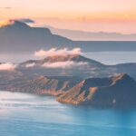A stunning sunset view of Taal Volcano and Lake, one of the most iconic things to do in Tagaytay.