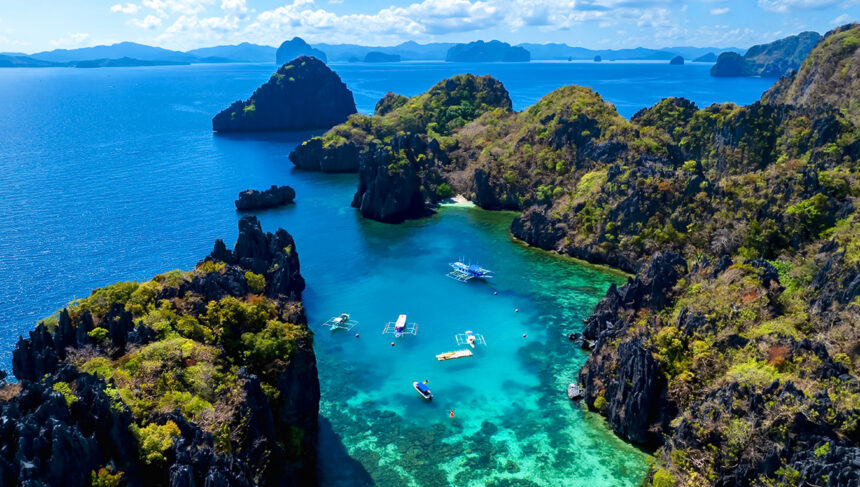 Aerial view of Coron lagoon and islands in Palawan, one of the most breathtaking sights and a must-see when exploring things to do in Coron,