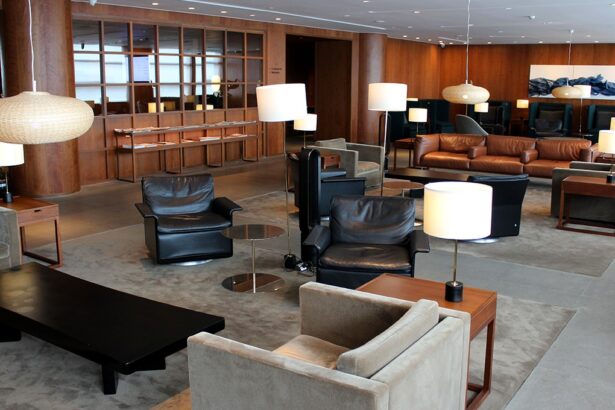 A luxury Manila airport lounge featuring mid-century modern leather armchairs, warm wood paneling, and ambient designer lighting for premium passenger comfort.