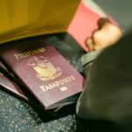 Filipino passports at an airport for Philippines Travel Insurance