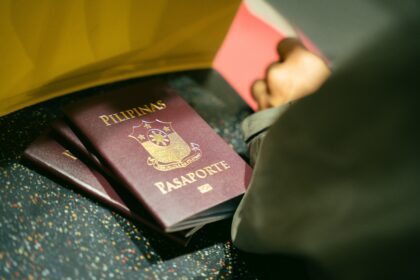 Filipino passports at an airport for Philippines Travel Insurance
