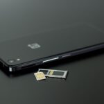 Black smartphone with a SIM card and memory card for Philippines SIM Card use