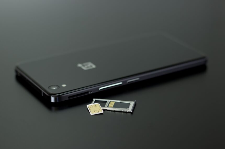 Black smartphone with a SIM card and memory card for Philippines SIM Card use
