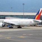 Philippine Airlines aircraft at an airport runway, highlighting key Philippines Airports for travellers