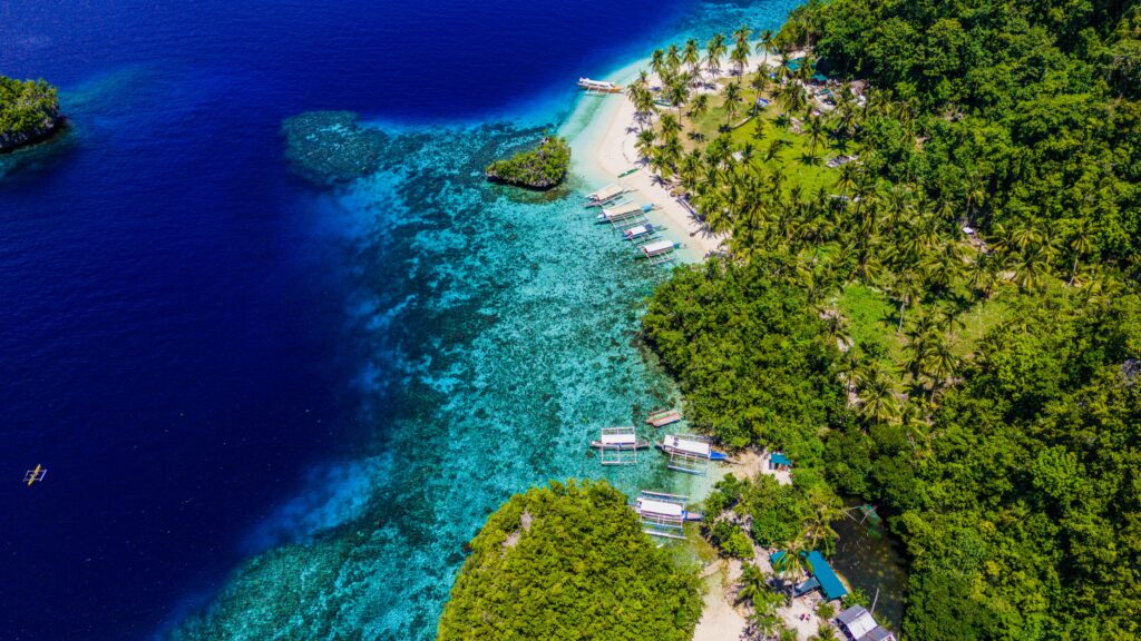 Aerial view of a tropical beach in the Philippines for planning Philippines Domestic Flights