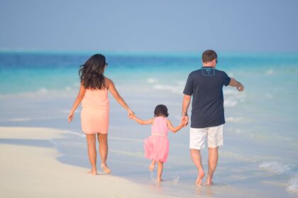 Family enjoying a sunny beach together during a relaxing Philippines family holiday