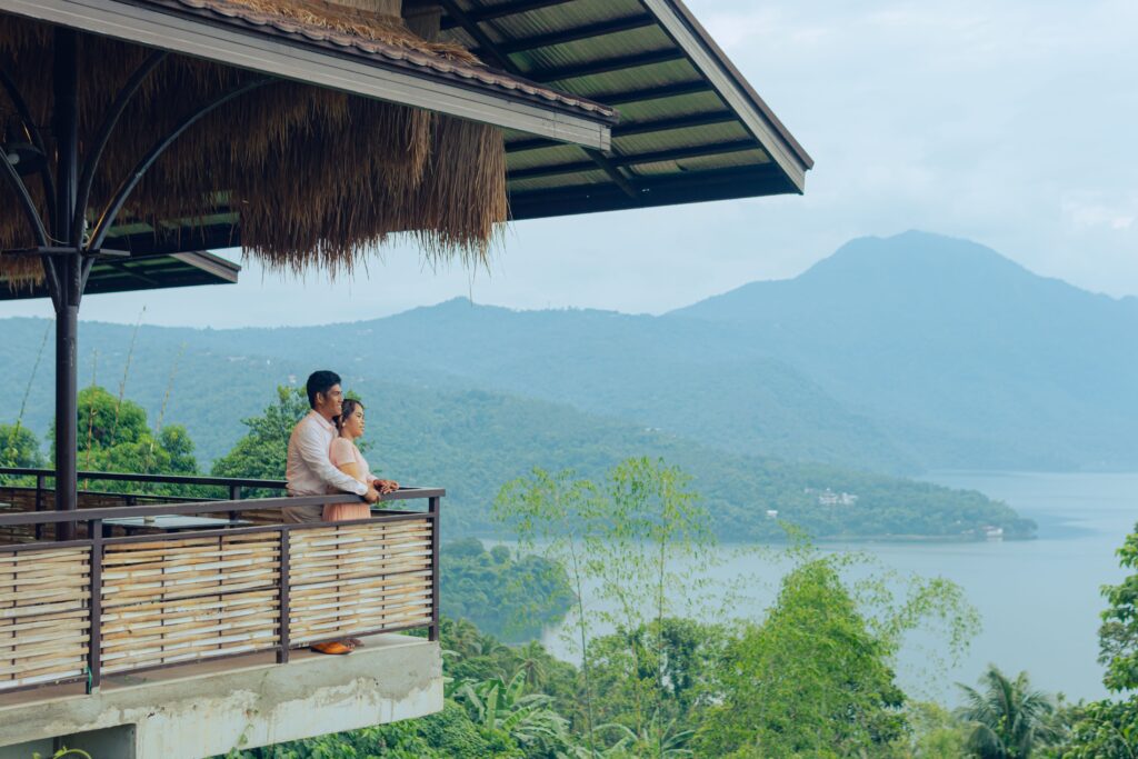 Romantic couple enjoying a scenic mountain view during a Philippines honeymoon