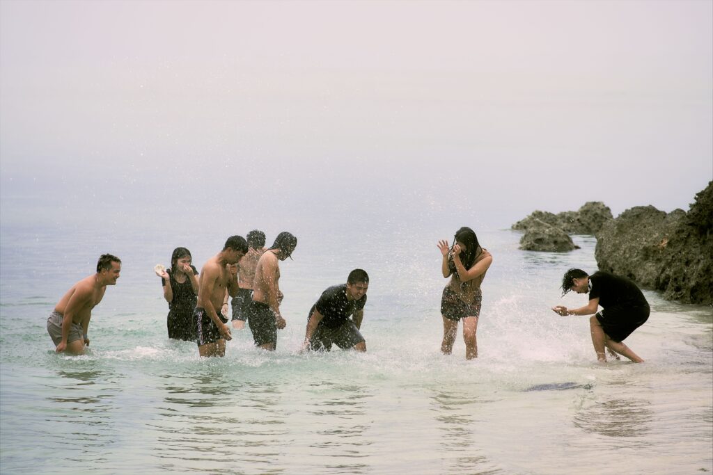 Friends enjoying the sea, inspiring adventures with Domestic Flights in the Philippines