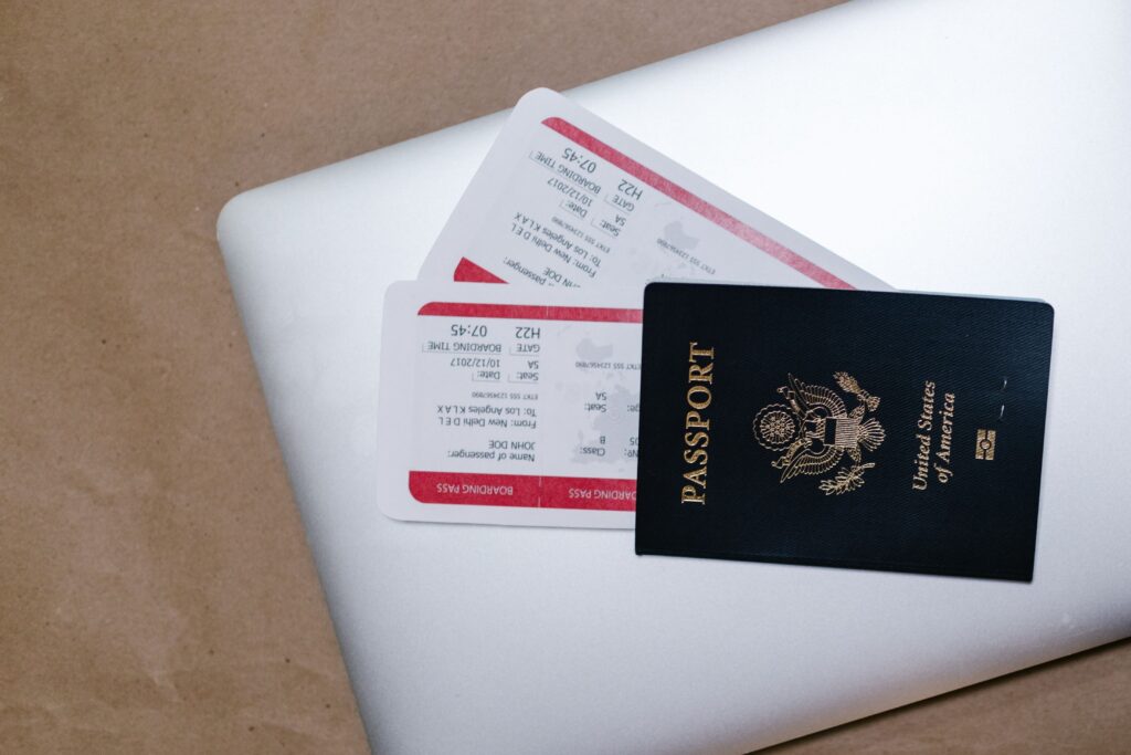 Philippines Airports travel planning with a passport, flight tickets and laptop