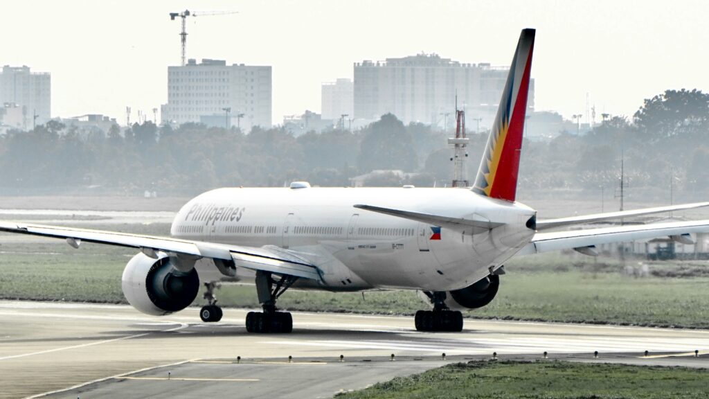 Commercial airplane on an airport runway for Philippines Domestic Flights